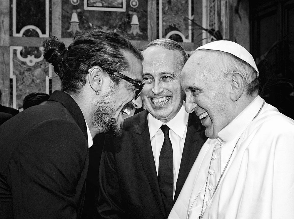Besides he even looks slick when meeting the Pope.