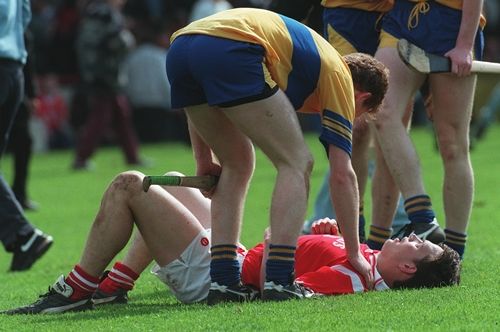 Alan Browne of Cork is consoled after their first round defeat by Clare 1995.