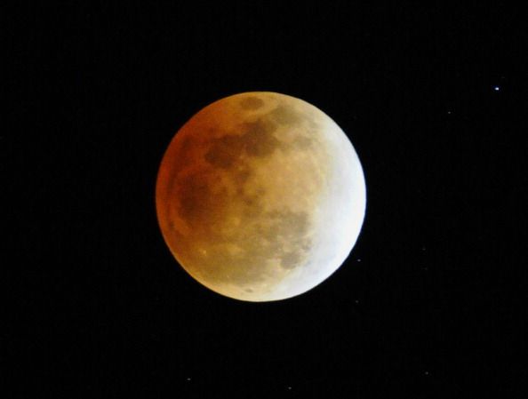 A partial lunar eclipse is seen in the s