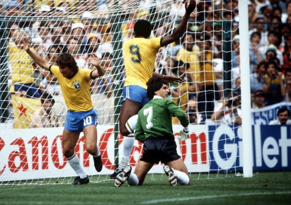 1982 World Cup Finals. Second Phase. Barcelona, Spain. 2nd July, 1982. Brazil 3 v Argentina 1. Brazil's Zico (10) score his side's first goal past Argentina's goalkeeper Ubaldo Fillol as Serginho celebrates in the net.