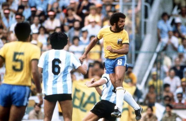 1982 World Cup Finals. Second Phase. Barcelona, Spain. 2nd July, 1982. Brazil 3 v Argentina 1. Brazil's Junior leaps high to clear the ball.
