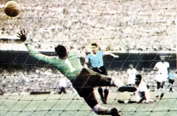 World Cup Final, 1950. Brazil. Maracana Stadium, Rio De Jainero. Brazil 1 v Uruguay 2. 16th July, 1950. Juan Schiaffino scores Uruguay's first goal past Brazilian keeper Barbosa.