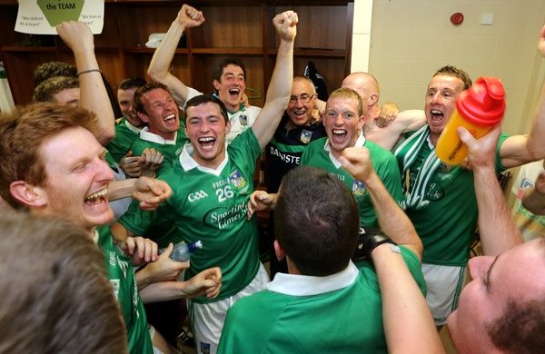 Limerick players celebrate in the dressing room with manager John Allen 14/7/2013