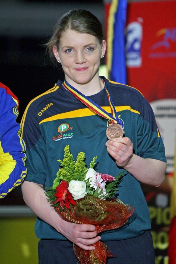 Clare Grace celebrates with her bronze medal 7/6/2014