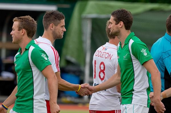 Brothers Mark Gleghorne and Paul Gleghorne shake hands before the game in which they play for England and Ireland respectively 4/7/2014