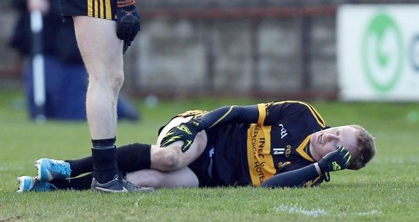 Kieran O'Leary checks on the injured Colm Cooper 15/2/2014