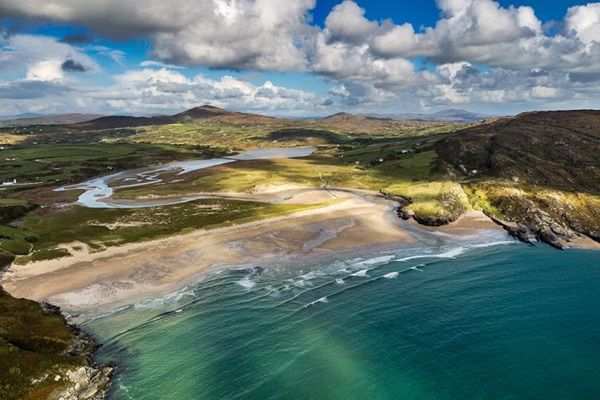 A popular beach on summer afternoons, Barley Cove is one of Cork's most beautiful beaches.  Seen from the air on an October afternoon, beautiful broken light plays across the landscape.