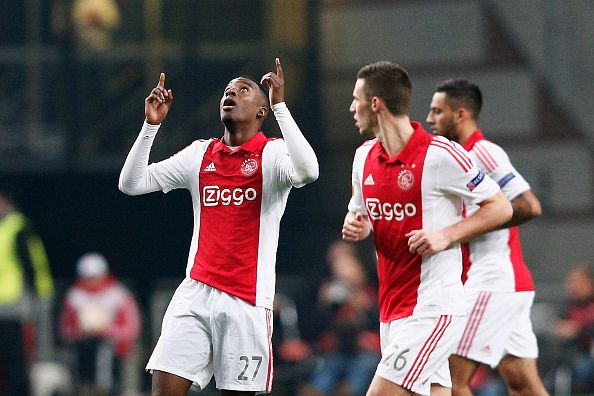 AMSTERDAM, NETHERLANDS - MARCH 19:  Riechedly Bazoer #27 of Ajax celebrates after scoring a goal to level the scores at 1-1 on aggregate during the UEFA Europa League Round of 16, second leg match between AFC Ajax v FC Dnipro Dnipropetrovsk at Amsterdam Arena on March 19, 2015 in Amsterdam, Netherlands.  (Photo by Dean Mouhtaropoulos/Getty Images)