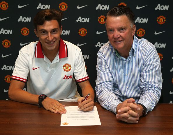 MANCHESTER, ENGLAND - JULY 11:  (EXCLUSIVE COVERAGE)  Matteo Darmian of Manchester United poses with Manager Louis van Gaal after signing for the club at Aon Training Complex on July 11, 2015 in Manchester, England.  (Photo by John Peters/Man Utd via Getty Images)