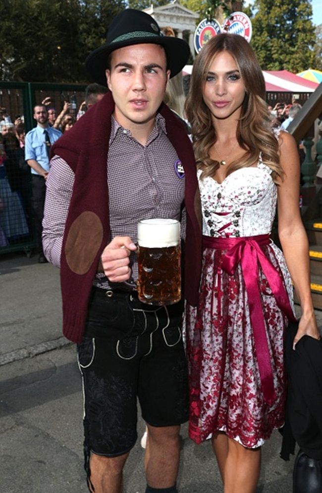 MUNICH, GERMANY - SEPTEMBER 30: Mario Goetze and his partner Ann-Kathrin Broemmel attend the 'FC Bayern Muenchen Wiesn'  during Oktoberfest 2015 at Kaeferschaenke on September 30, 2015 in Munich, Germany.  (Photo by Gisela Schober/Getty Images)