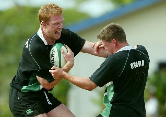Ireland Rugby Tour 2003 Training Paul O'Connell tackled by Ronan O'Gara Mandatory Credit ©INPHO/Billy Stickland