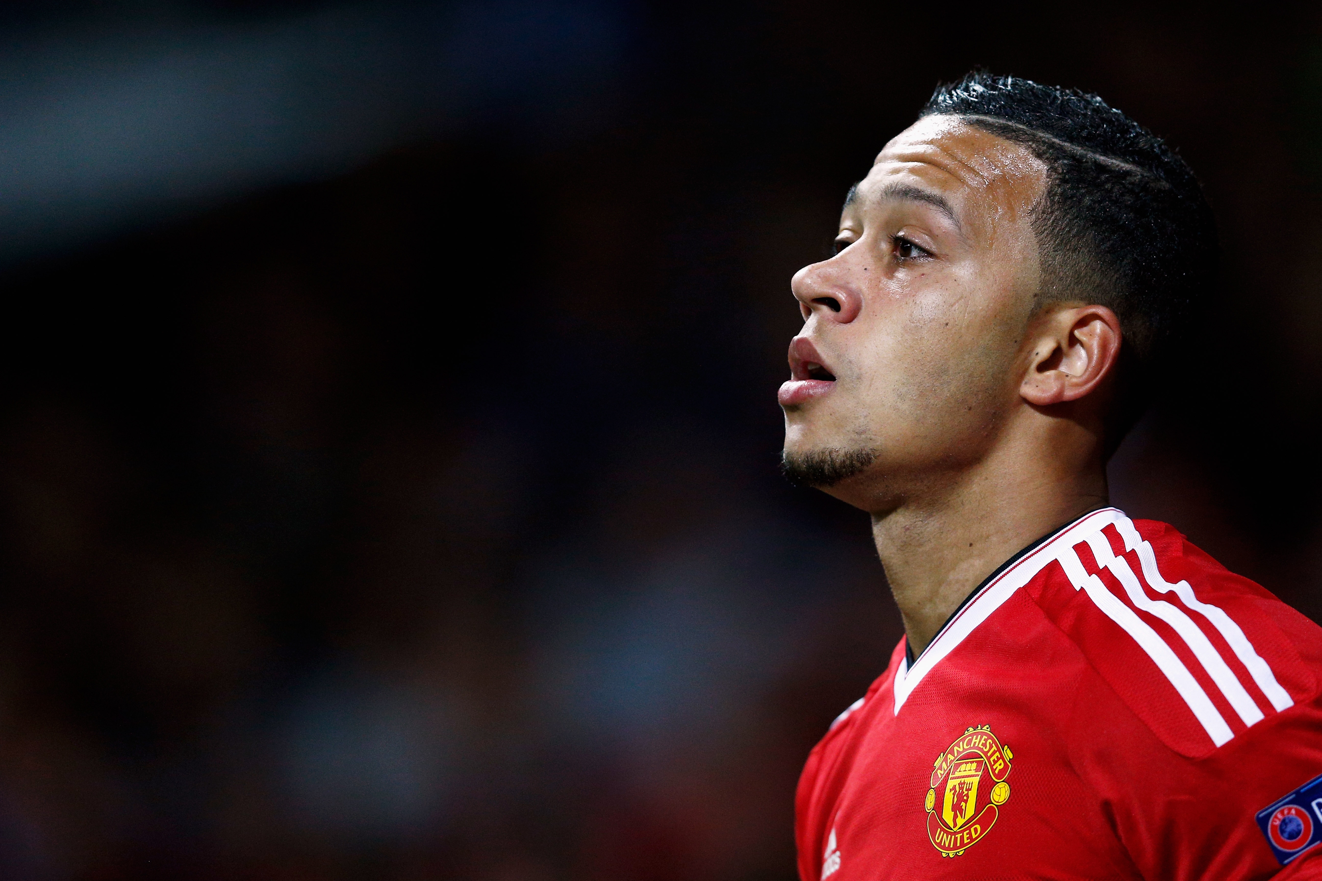MANCHESTER, ENGLAND - SEPTEMBER 30:  Memphis Depay of Manchester United looks on during the UEFA Champions League Group B match between Manchester United FC and VfL Wolfsburg at Old Trafford on September 30, 2015 in Manchester, United Kingdom.  (Photo by Dean Mouhtaropoulos/Getty Images)