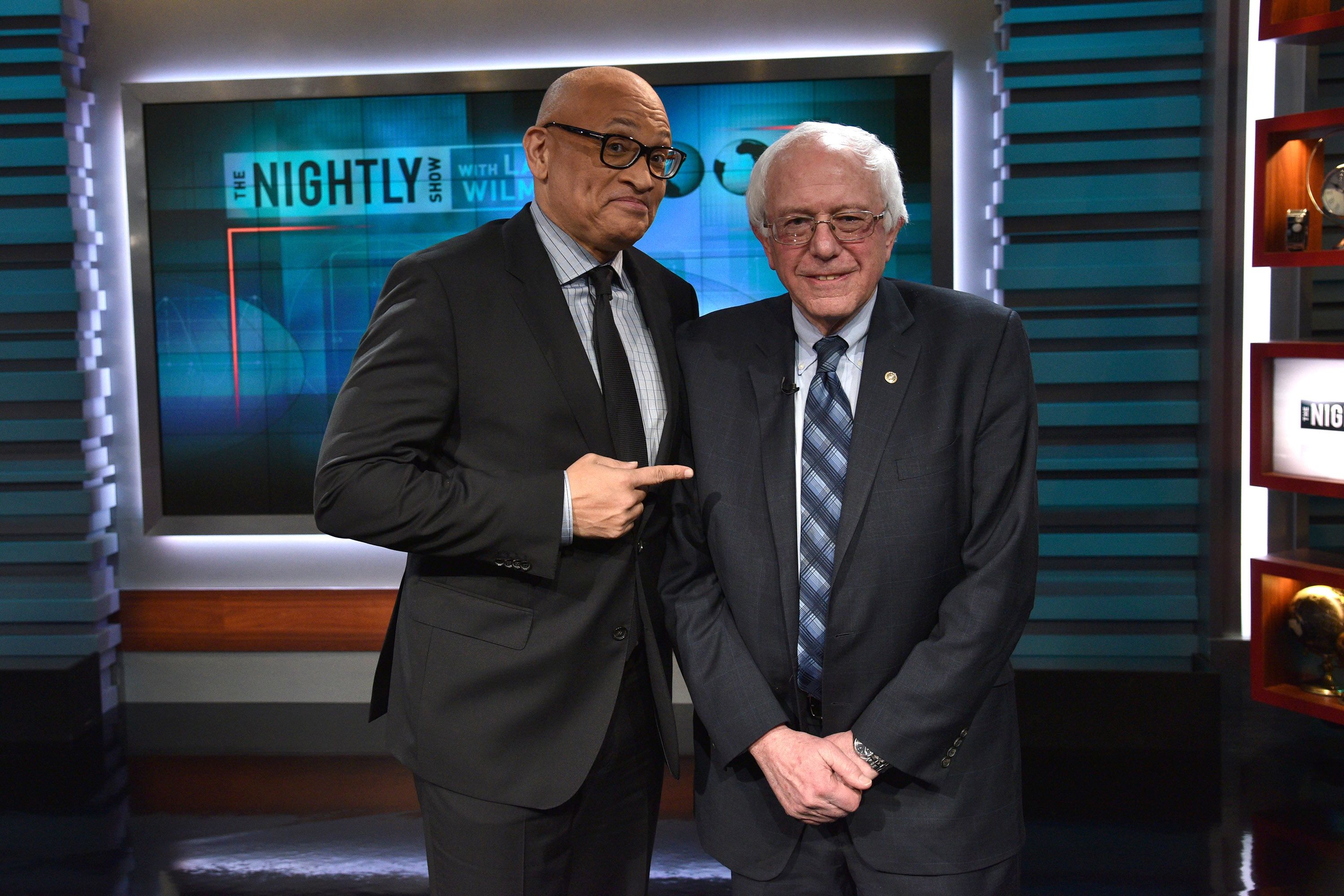 NEW YORK, NY - JANUARY 05: Host Larry Wilmore and Senator Bernie Sanders attend Comedy Central's "The Nightly Show With Larry Wilmore" on January 5, 2016 in New York City. (Photo by Bryan Bedder/Getty Images for Comedy Central)