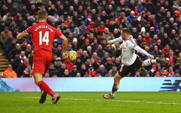 LIVERPOOL, ENGLAND - JANUARY 17:  Wayne Rooney of Manchester United scores the opening goal during the Barclays Premier League match between Liverpool and Manchester United at Anfield on January 17, 2016 in Liverpool, England.  (Photo by Alex Livesey/Getty Images)