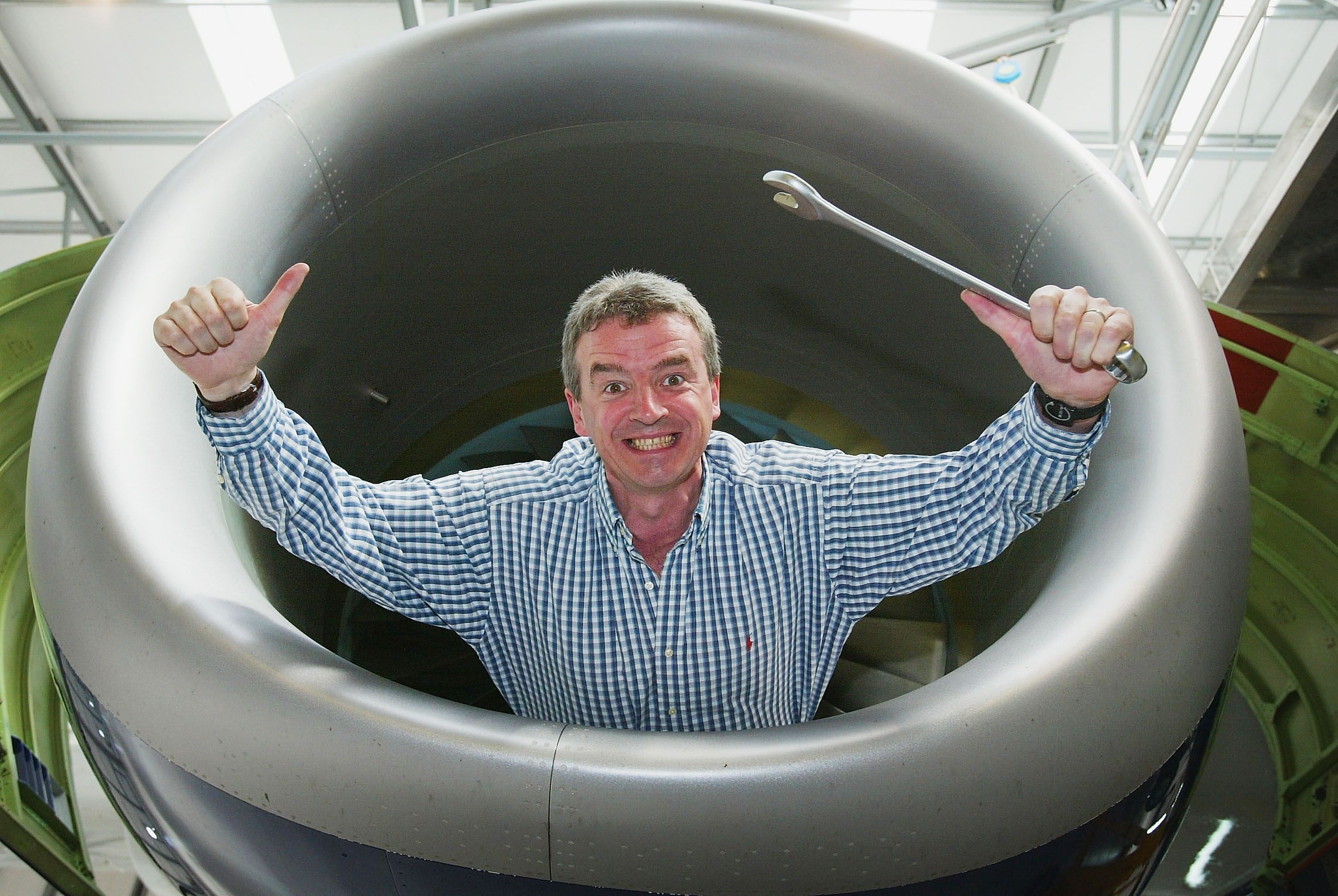 PRESTWICK, SCOTLAND - MAY 10: Michael O'Leary Chief Executive of low fare airline Ryanair poses for the camera during the opening of a new maintenance facility, on May 10, 2004 at Prestwick, Scotland. Low fares airline Ryanair officially opened the new ?10 million maintenace hanger at Prestwick Airport creating up to 200 new jobs for the area. (Photo by Christopher Furlong/Getty Images)