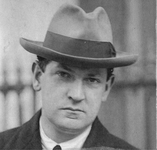 Michael-Collins-with-hat_600