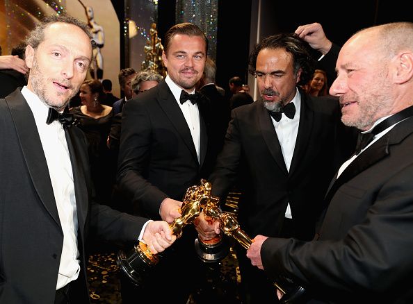 HOLLYWOOD, CA - FEBRUARY 28: (L-R) Cinematographer Emmanuel Lubezki, winner of Best Cinematography for 'The Revenant," actor Leonardo DiCaprio, winner of Best Actor for 'The Revenant,' director Alejandro Inarritu, winner of Best Director for 'The Revenant,' and Producer Steve Golin, winner of Best Film for 'Spotlight,' attend the 88th Annual Academy Awards at Dolby Theatre on February 28, 2016 in Hollywood, California. (Photo by Christopher Polk/Getty Images)