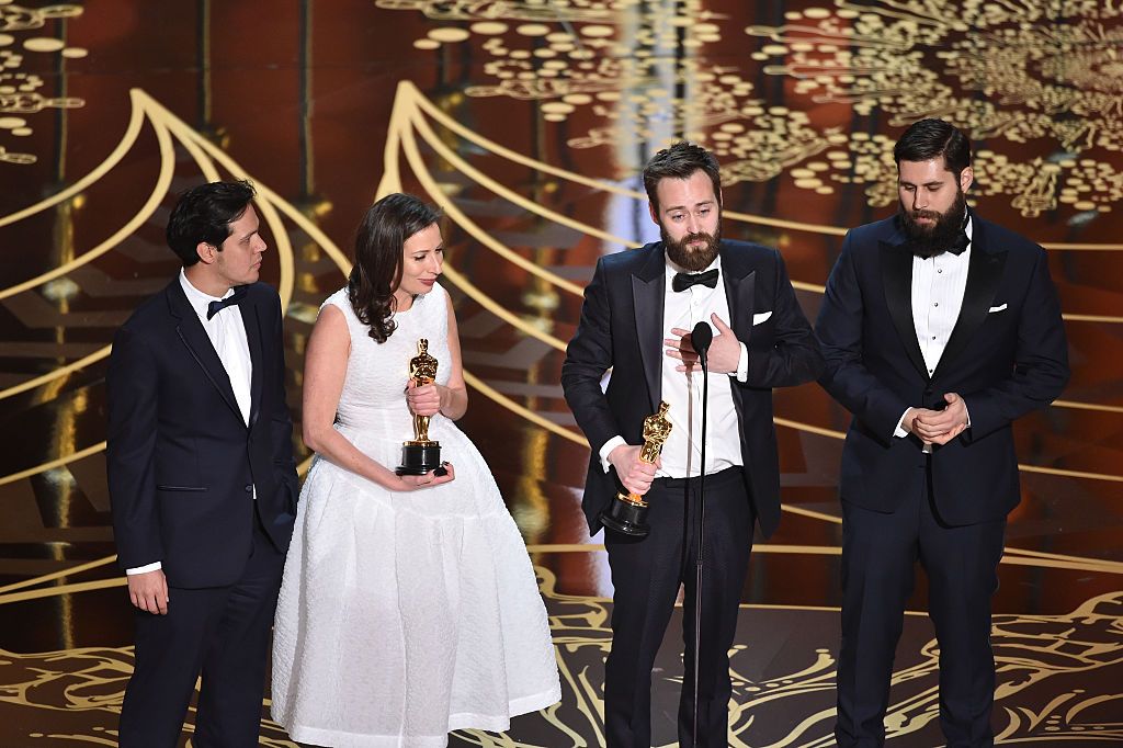 HOLLYWOOD, CA - FEBRUARY 28: Filmmakers Benjamin Cleary (2nd L) and Serena Armitage (C) and crew accept the Best Live Action Short Film award for 'Stutterer' onstage during the 88th Annual Academy Awards at the Dolby Theatre on February 28, 2016 in Hollywood, California. (Photo by Kevin Winter/Getty Images)