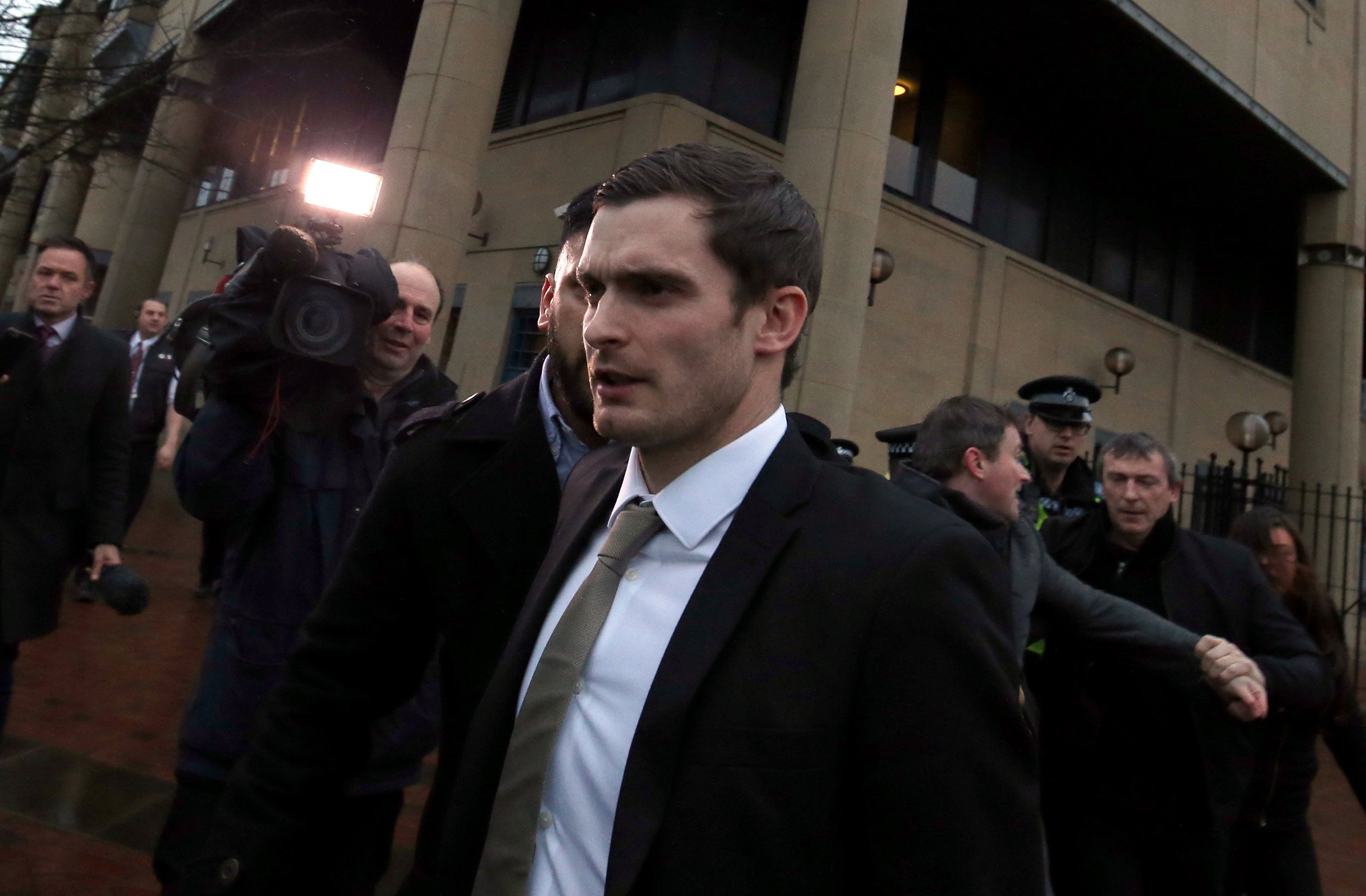 BRADFORD, ENGLAND - MARCH 02: Footballer Adam Johnson leaves Bradford Crown Court on day fourteen of the trial where he was found guilty of one count of child sexual assault charges on March 2, 2016 in Bradford, England. The former Sunderland FC midfielder, 28, from Castle Eden, County Durham, had already admitted one charge of sexual activity with a child and one charge of child grooming. (Photo by Nigel Roddis/Getty Images)