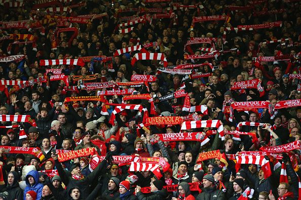 LIVERPOOL, ENGLAND - JANUARY 17: Liverpool fans display their scarves prior to the Barclays Premier League match between Liverpool and Manchester United at Anfield on January 17, 2016 in Liverpool, England. (Photo by Alex Livesey/Getty Images)