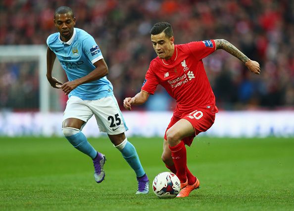 LONDON, ENGLAND - FEBRUARY 28: Philippe Coutinho of Liverpool is chased by Fernandinho of Manchester City during the Capital One Cup Final match between Liverpool and Manchester City at Wembley Stadium on February 28, 2016 in London, England. (Photo by Michael Steele/Getty Images)