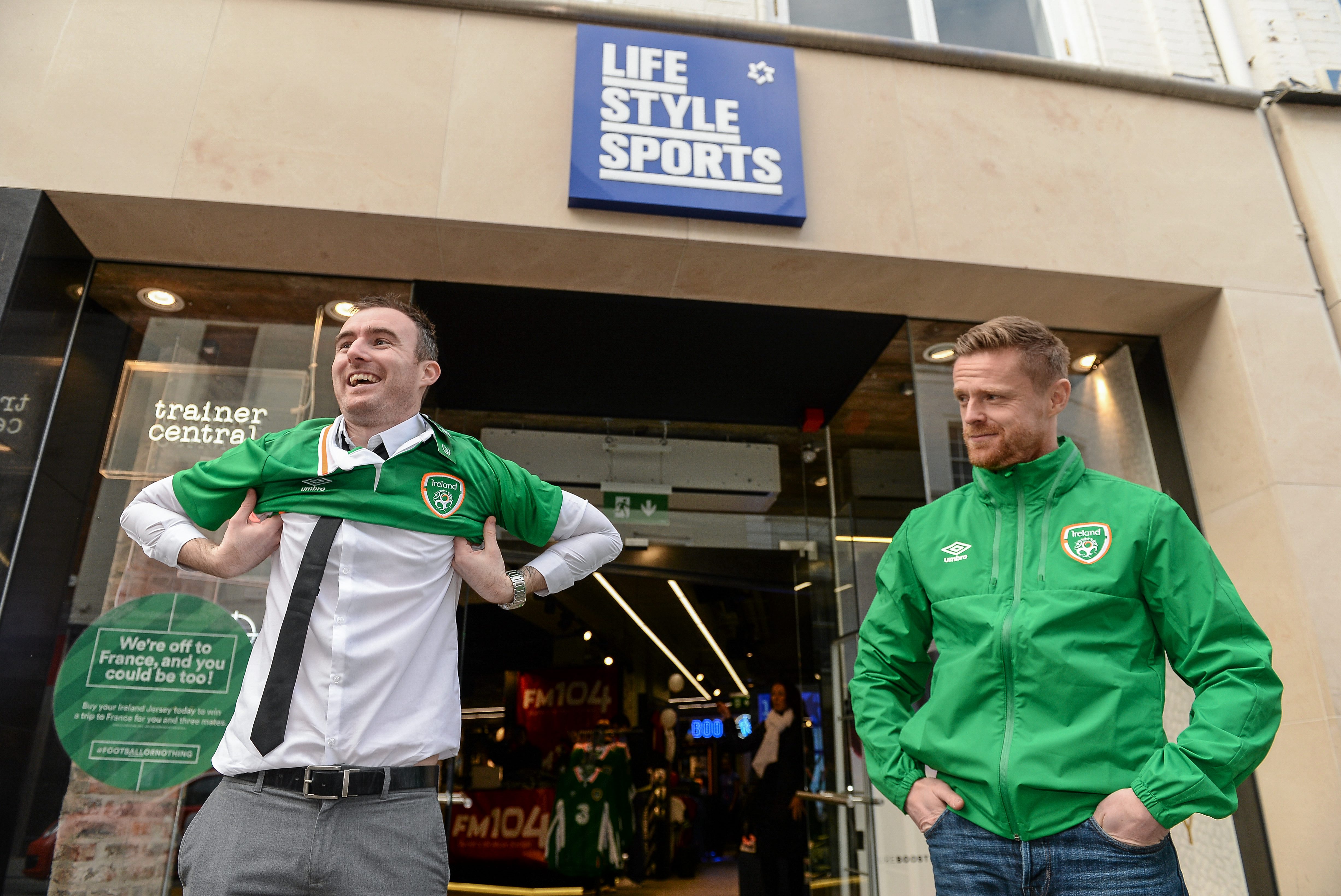 10 March 2016; To celebrate the new Republic of Ireland jersey going on sale at Life Style Sports, the brand announced today that it will be supporting Irish supporters by putting 12 football trips to France up for grabs for anyone who buys their jersey at Life Style Sports from today, 10th March, to 27th May. The first winner, Gary Kinsella, from Coolock, Dublin, was chosen this morning and he is pictured with Irish soccer legend Damien Duff in Life Style Sports on Grafton St. For further information on how to enter please see www.lifestylesports.com/greenticket. Life Style Sports, Grafton Street, Dublin. Picture credit: Brendan Moran / SPORTSFILE *** NO REPRODUCTION FEE ***