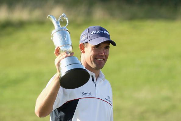 SOUTHPORT, UNITED KINGDOM - JULY 20: Padraig Harrington of the Republic of Ireland celebrates with the Claret Jug in front of the scoreboard after winning by 4 strokes during the final round of the 137th Open Championship on July 20, 2008 at Royal Birkdale Golf Club, Southport, England. (Photo by David Cannon/Getty Images)