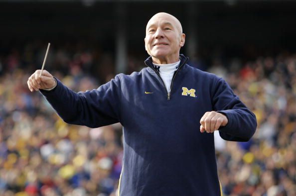 ANN ARBOR, MI - NOVEMBER 4: Actor Patrick Stewart who played Captain Jean-Luc Picard in Star Trek and starred in X-Men conducts the Michigan Wolverines Marching Band during halftime of a game against Ball State Cardinals on November 4, 2006 at Michigan Stadium in Ann Arbor, Michigan. Michigan won 34-26. (Photo by Brian Bahr/Getty Images)
