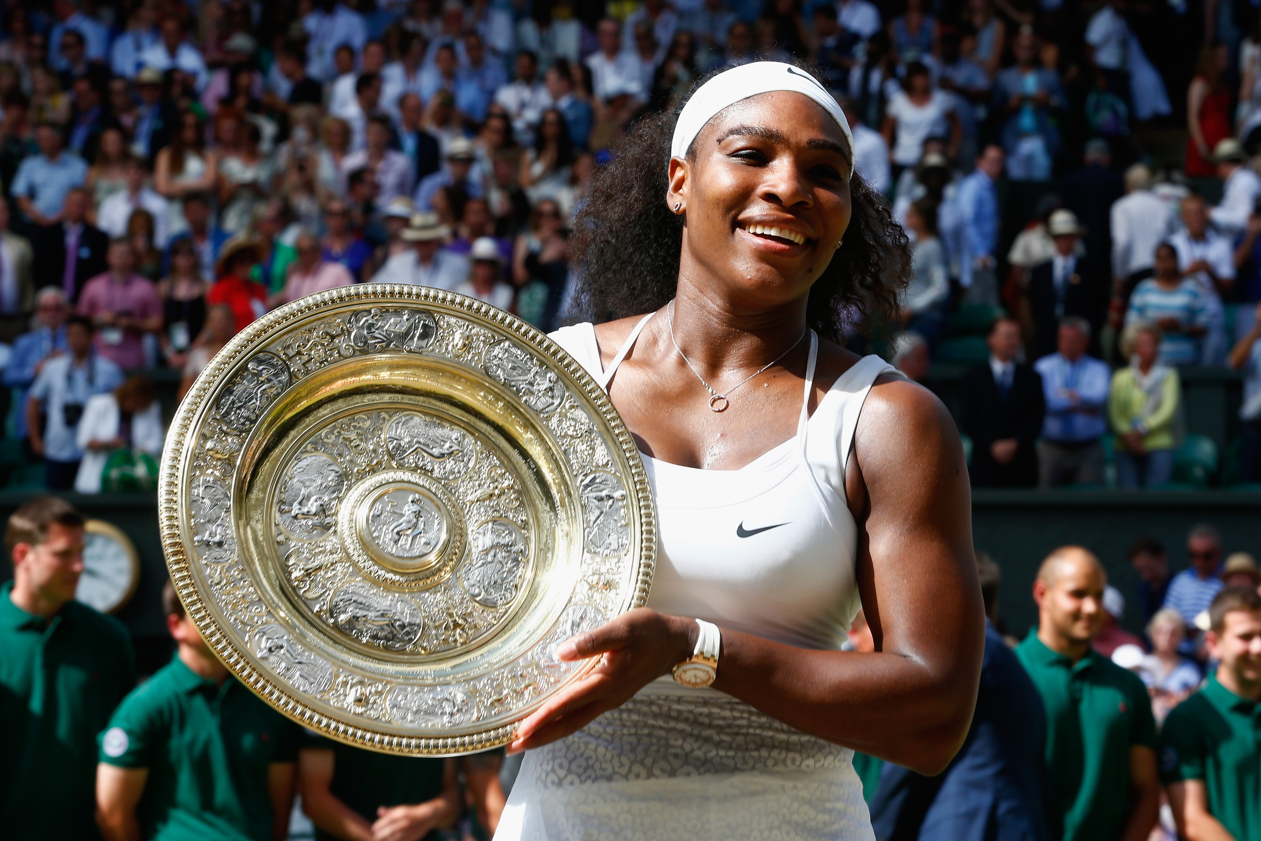 LONDON, ENGLAND - JULY 11: Serena Williams of United States celebrates with the trophy after winning the Final of the Ladies Singles against Garbine Muguruza of Spain during the day twelve of the Wimbledon Lawn Tennis Championships at the All England Lawn Tennis and Croquet Club on July 11, 2015 in London, England. (Photo by Julian Finney/Getty Images)