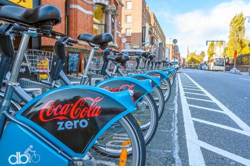 Dublin, Ireland - Oct 25, 2014: Cocacola new sponsor of Dublin bikes parked on Nassay street in Dublin, Ireland on October 25, 2014