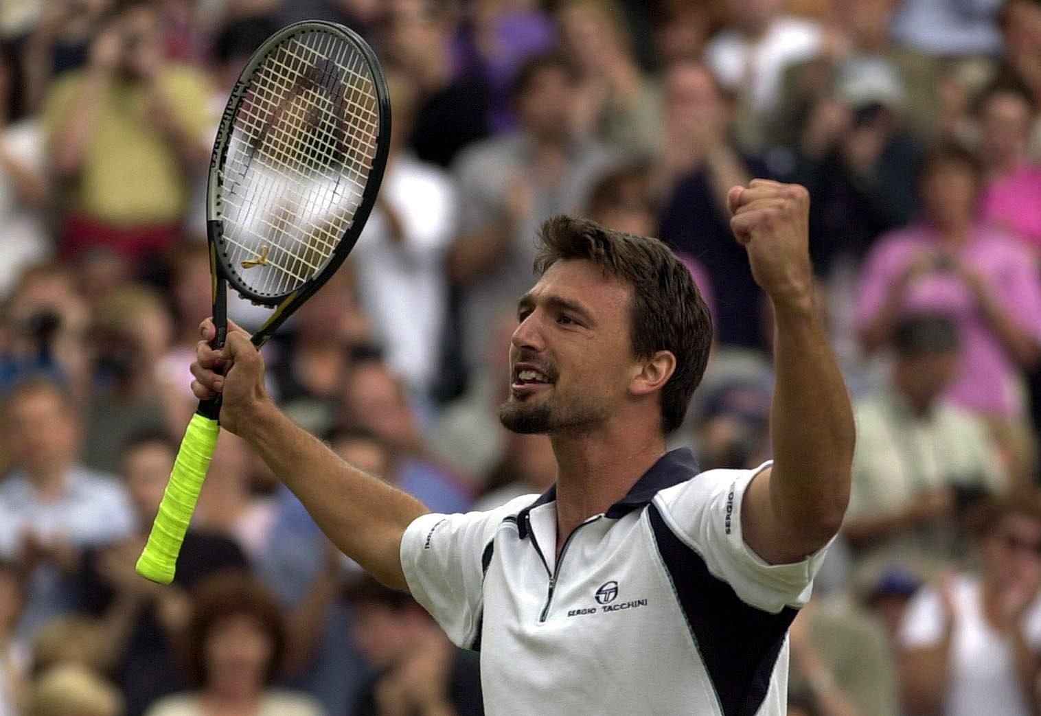 8/7/2001 Wimbledon Goran Ivanisevic of Croatia celebrates his victory during the men's semi-final ©INPHO/Allsport