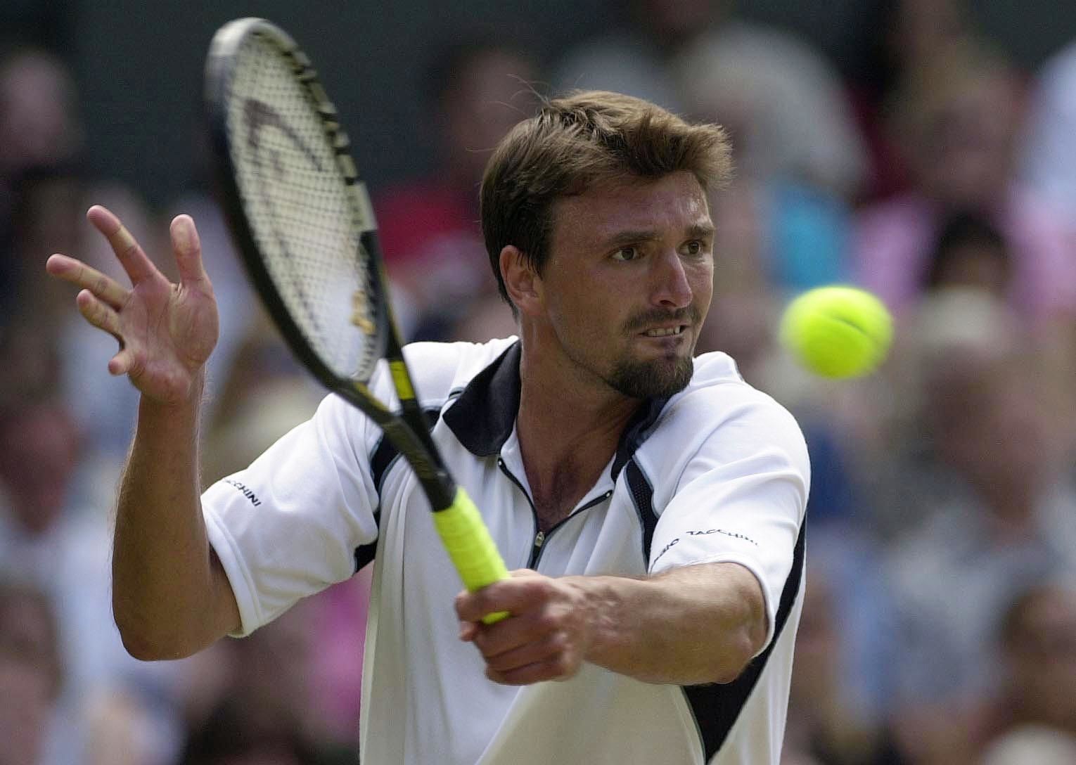 4/7/2001 Wimbledon Goran Ivanisevic of Croatia on his way to victory during the men's quarter finals ©INPHO/Allsport