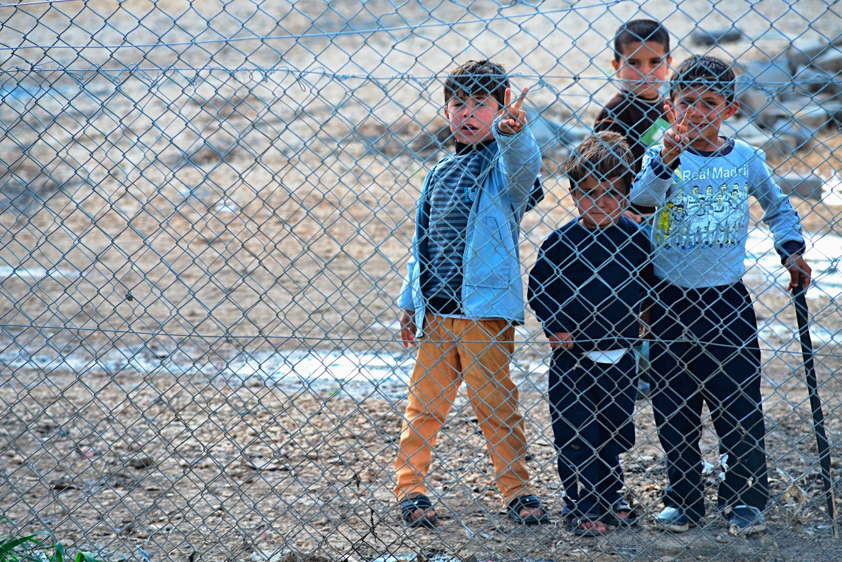 Suruc, Turkey - March 31, 2015: Syrian people in refugee camp in Suruc. These people are refugees from Kobane and escaped because of Islamic state attack.