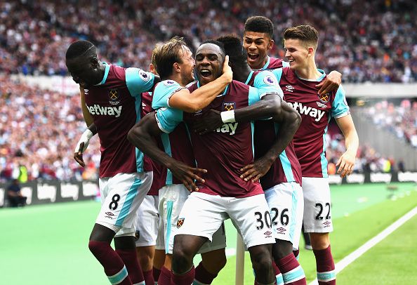 LONDON, ENGLAND - AUGUST 21: Michail Antonio (#30) of West Ham United celebrates scoring the opening goal with team mates during the Premier League match between West Ham United and AFC Bournemouth at London Stadium on August 21, 2016 in London, England. (Photo by Michael Regan/Getty Images)