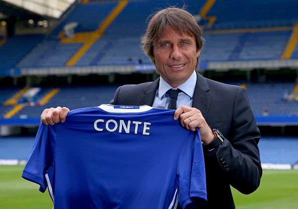 LONDON, ENGLAND - JULY 14: The new Chelsea Manager Antonio Conte poses with a Chelsea shirt at Stamford Bridge on July 14, 2016 in London, England. (Photo by Steve Bardens/Getty Images)