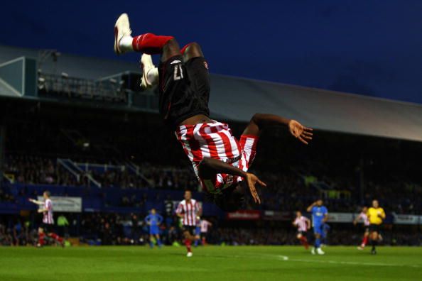 PORTSMOUTH, UNITED KINGDOM - MAY 18: Kenwyne Jones of Sunderland celebrates scoring the first goal of the game during the Barclays Premier League match between Portsmouth and Sunderland at Fratton Park on May 18, 2009 in Portsmouth, England. (Photo by Bryn Lennon/Getty Images)
