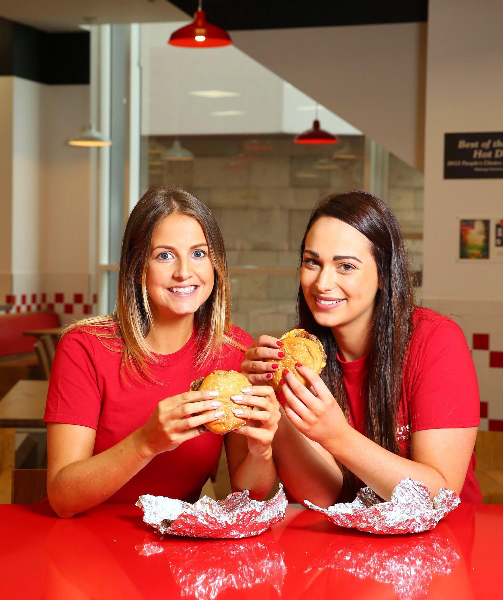 3/10/16 ***NO REPRO FEE*** Five Guys Burgers and Fries open in Dundrum Shopping Centre Laura Smith and Laura Purcell pictured as Five Guys Burgers and Fries, the leader of the Fast Casual Burger market in the US, opened its first location in the Republic of Ireland in Dublin’s Dundrum Shopping Centre creating over 80 jobs. Five Guys is known for its fresh, made to order burgers with a vast choice of toppings, customisable at no extra charge and fries that are fresh potatoes cooked in 100% peanut oil. Irish customers can expect to receive an authentic Five Guys experience in Dublin, just as they would in the U.S. The Murrell family and their team have ensured that every Five Guys restaurant, from the food to the layout, is consistent around the world. Pic: Marc O'Sullivan For Press enquiries & Imagery please contact Joanne Rochford | Invoke PR & Events| Email: joanne@invoke.ie Tel: 00 3531-678 8878 | M: 00 353 86 3537496