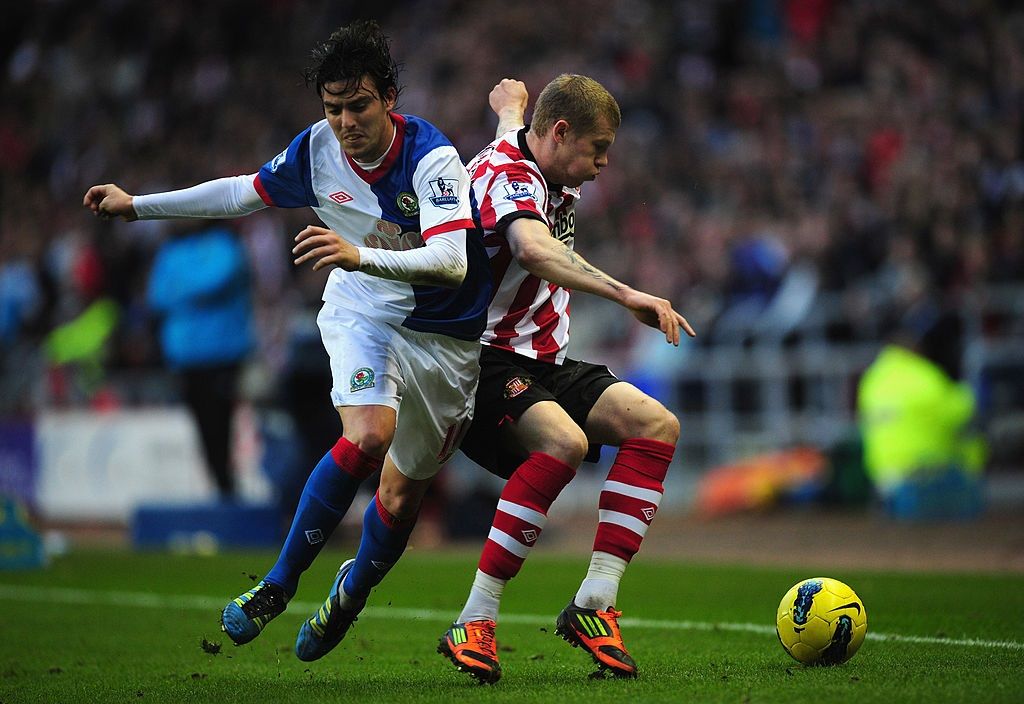 SUNDERLAND, ENGLAND - DECEMBER 11: Blackburn player Mauro Formica (l) battles with James McClean of Sunderland during the Barclays premier league game between Sunderland and Blackburn Rovers at Stadium of Light on December 11, 2011 in Sunderland, England. (Photo by Stu Forster/Getty Images)