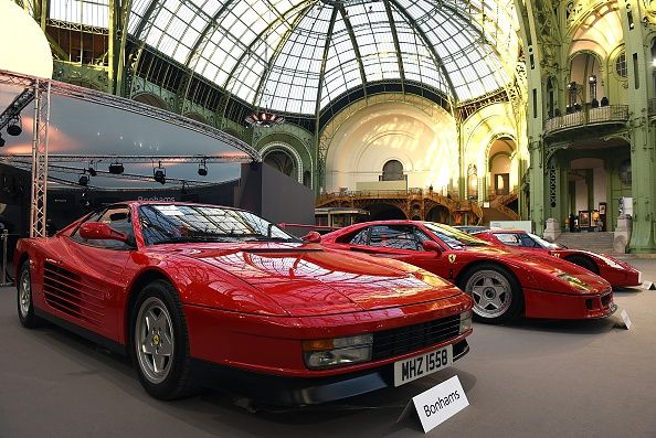 PARIS, FRANCE - FEBRUARY 04: A Ferrari Testarossa and a Ferrari F40 are seen during a vintage cars and motorbikes exhibition, by Bonhams auction house, at Le Grand Palais on February 4, 2015 in Paris, France. (Photo by Antoine Antoniol/Getty Images)