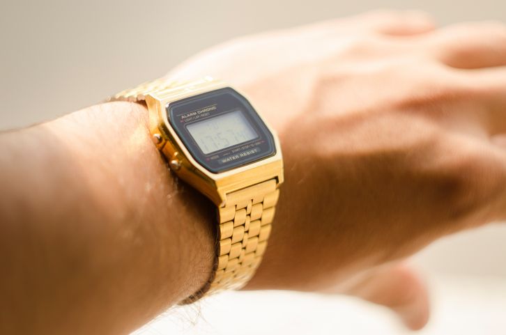 A digital watch on a wrist